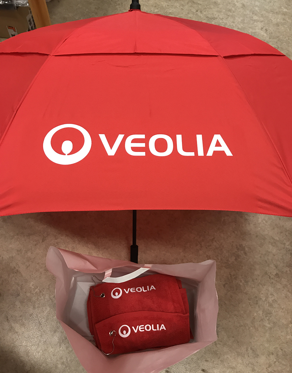 Golfparaplyer och golfhanddukar