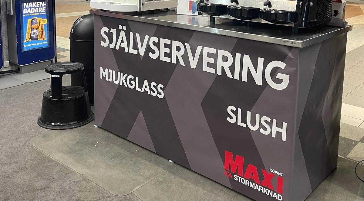 Inklädning av disk åt ICA Maxi